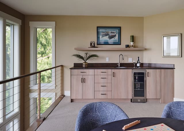 wet bar with sink and cabinets